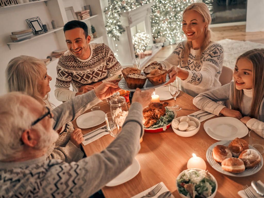 family gathering together during the holidays